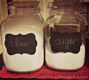 Chalkboard canisters via ComeHomeForComfort.com